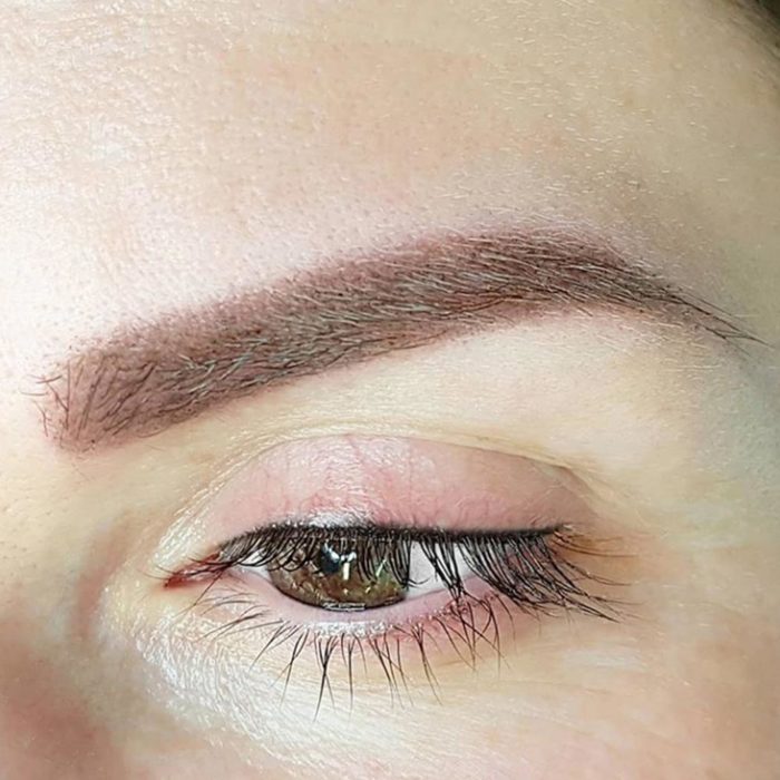 Natural eyebrows with permanent makeup (PMU) by amiea International Master Trainer Olga Hendricks, example PMU treatment eyebrows, close-up